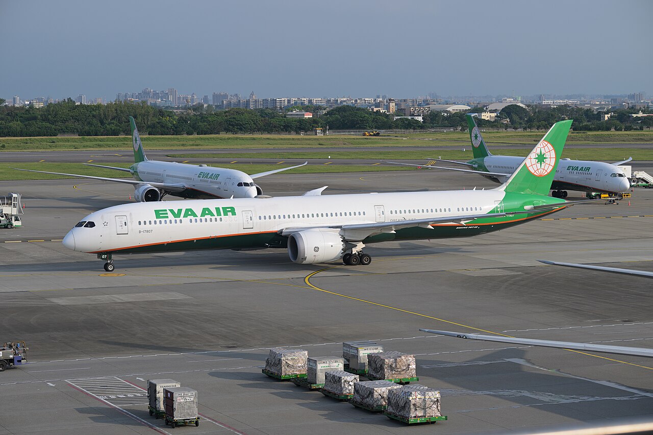 EVA Air Boeing 787-10 B-17807, operating flight 871 to Hong Kong, taxis past other EVA Air 787s at Taiwan Taoyuan International Airport.